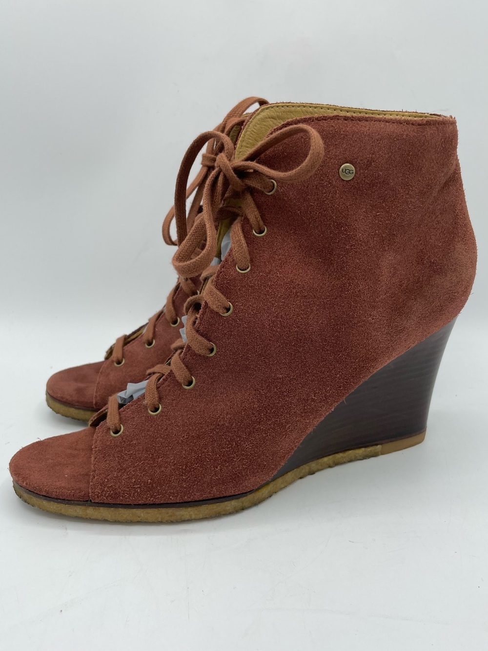 UGG Elyse Rust Suede Lace-Up Wedge Bootie with Open Toe Design.